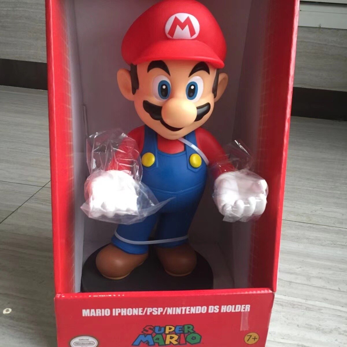 Super Marios Action Figure Phone or remote holder